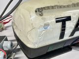 a close up of a white and black car with a number 7 on it