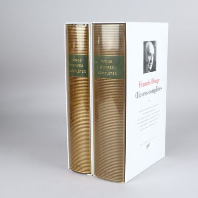 the two books are sitting on the table next to each other
