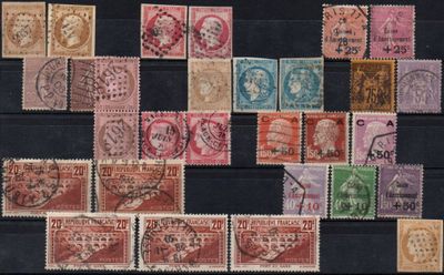 an image of a collection of old stamps on a black surface
