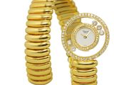 an image of a woman ' s wrist watch with a gold bracelet