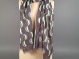 a close up of a mannequin torso with a scarf on it