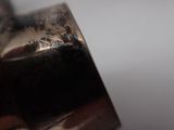 a close up of a metal object on a table