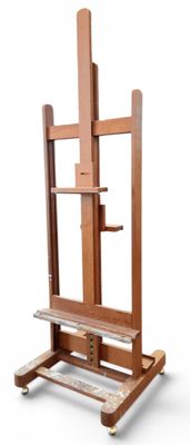 a wooden easer with a shelf on it on a white background