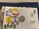 a small piece of paper with a qr code on it