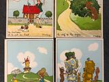 quatre cartes représentant des personnes et des animaux, posées sur une table
