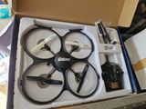 a box with a remote control drone inside of it