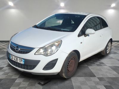 a picture of a white opel parked in a garage