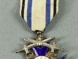 purple and white medal with blue star and silver star on it