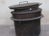 three pots that are stacked on top of each other