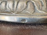 a close up of a metal object on a table