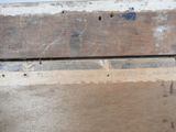 a close up of a piece of wood with a hole in it