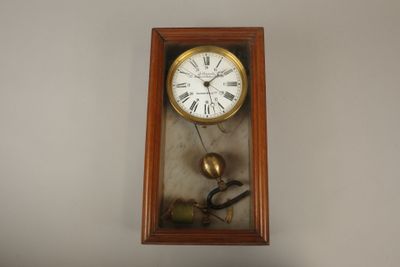 a clock that is hanging on the wall in the room