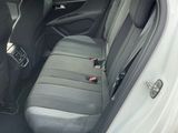 the back seats of a car are empty in the parking lot