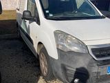 a picture of a white van parked in a parking lot