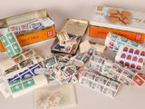many different types of stamps and stamps in a box