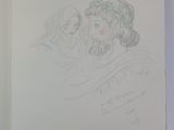 an open book with a drawing of a man and a woman