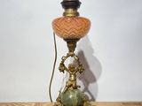 an image of a lamp that is sitting on a wooden table