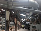 a large room with a lot of pipes in it