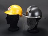two helmets on the head of a mannequin