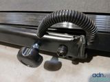 a close up of a piece of luggage with a coiled handle