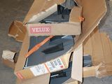 a pile of boxes that are sitting on the floor