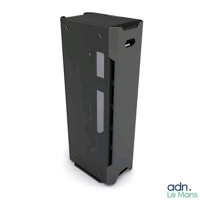 un boîtier d'ordinateur noir posé sur une surface blanche
