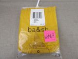 a yellow bag with a sticker on it that says ba & sh