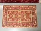 two rugs that are on the floor next to each other