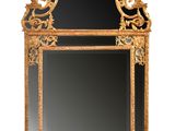 an image of a mirror with a gold frame on a white background