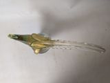 a glass bird that is sitting on a table