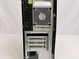 an image of a computer tower with a keyboard and mouse on top of it
