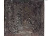 an image of a metal plaque with a design on it