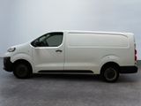 a white van that is parked in a parking lot