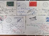 many postcards on a table with some writing on them