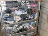 a metal cart with many items in it in a room