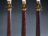 pair of antique brass and red marble lamps on stands