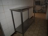 an image of a stainless steel table in a kitchen