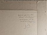 a piece of cardboard that has writing on it