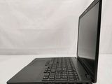 a close up of a laptop computer sitting on top of a white surface