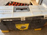 a box with a lot of tools in it sitting on a pallet