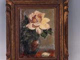 une photo d'un tableau représentant une fleur dans un vase