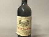 a bottle of wine that is sitting on a table