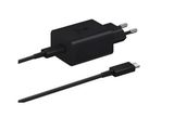 un chargeur noir muni d'un câble USB