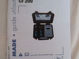 a manual for a machine that is sitting on a bed