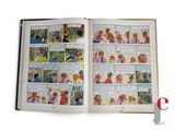 an open comic book with pictures of people in it