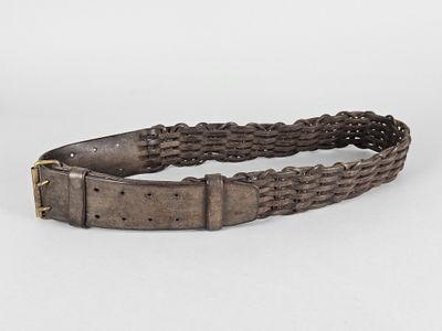 a close up of a belt with a metal buckle on it
