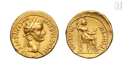 a gold coin with an image of a woman sitting on a chair