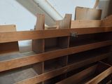 a pile of wood that is sitting on the floor