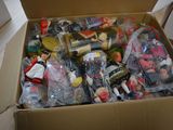 a box full of toys and other items in it