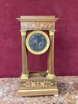 a clock that is sitting on top of a table
